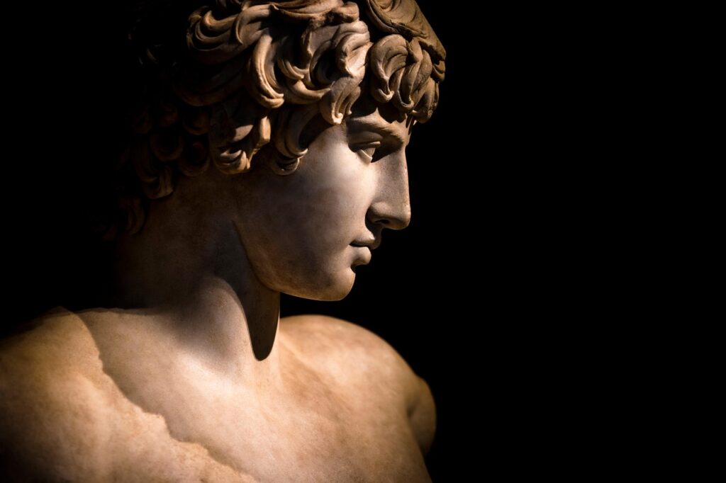 Statue of Apollo, the ancient Greek god, photographed against a plain background.